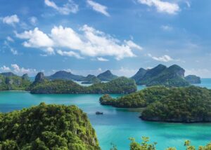 Spectacular aerial view of Ang Thong Marine Park emerald lagoons with limestone islands and tropical jungle vegetation in Thailand